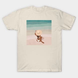 Girl in hat on the beach T-Shirt